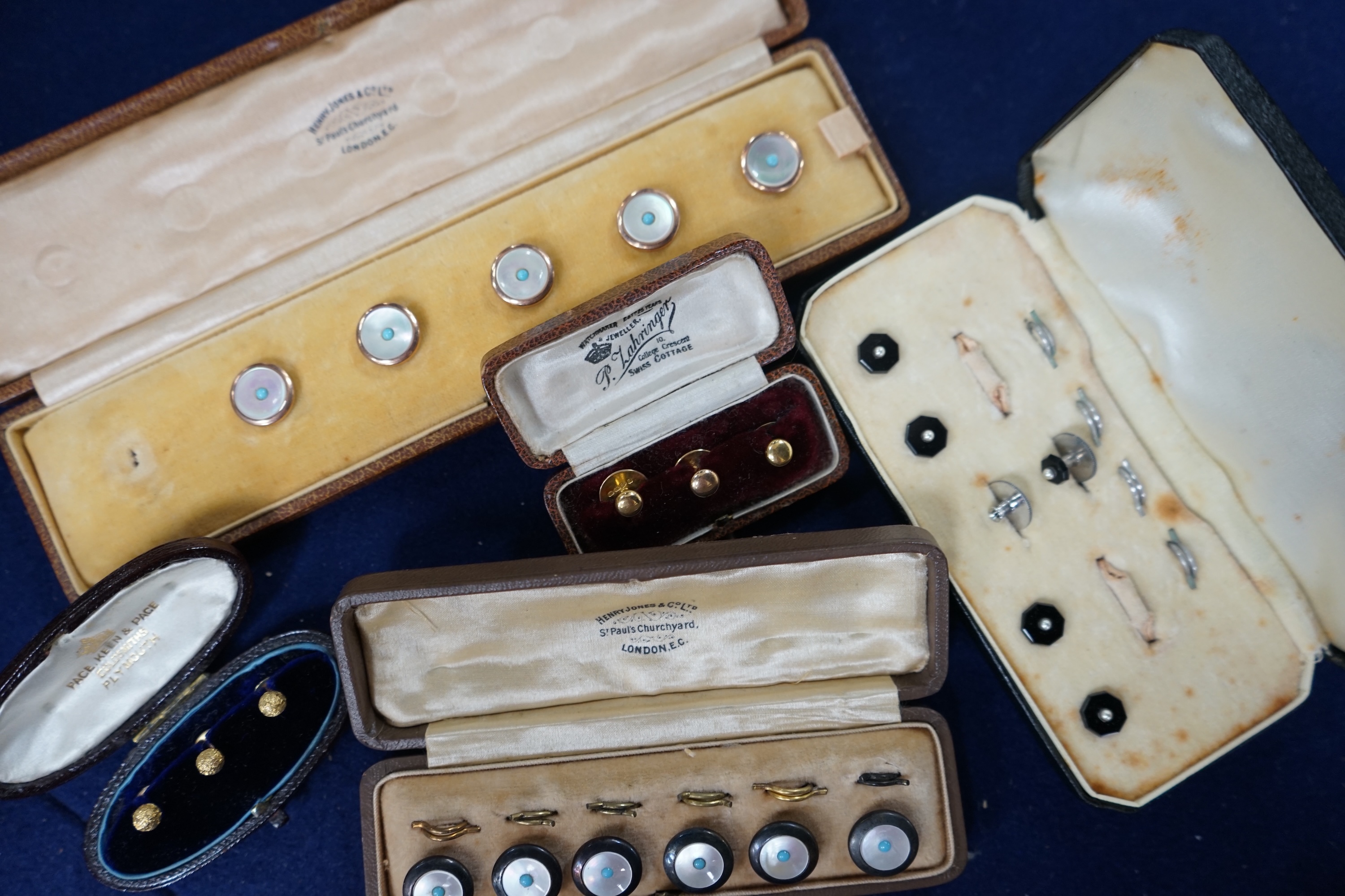 Two cased sets of three 18ct dress studs, 5.9 grams and three other cased sets of studs, one incomplete. Condition - fair to good